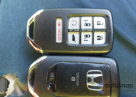 2020 Honda Odyssey Elite z USA, uszkodzony, nr VIN 5FNRL6H94LB045159